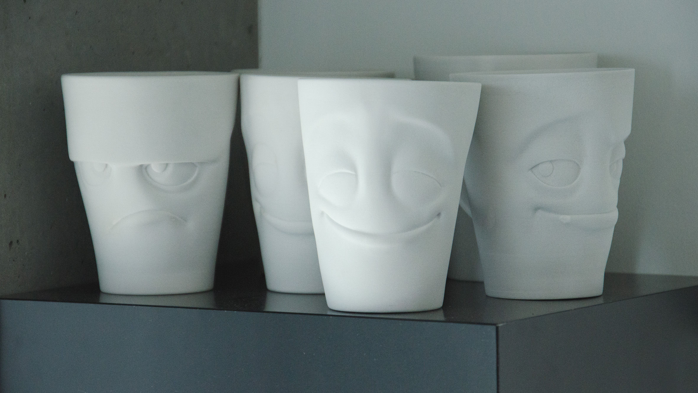  But which dialect the mugs with their 11oz capacity will speak and what their personal background will be – that’s a secret for now. One thing’s already for sure: Their demeanor will be a little bit “rougher” than our cheerful little TASSEN bowls and cups. But wait until the video comes out and you will get to know the mugs and all their individual flavor, up-close and personal. The “hard” facts about the finished products are already here. The TASSEN Mugs will feature: · Coffee mugs from hard porcelain in TASSEN quality · Filling capacity approx. 11 oz (0.35 liters) · Variety of moods and facial expressions · Sets of various mugs combined · Features handle · 100% Made in Germany 