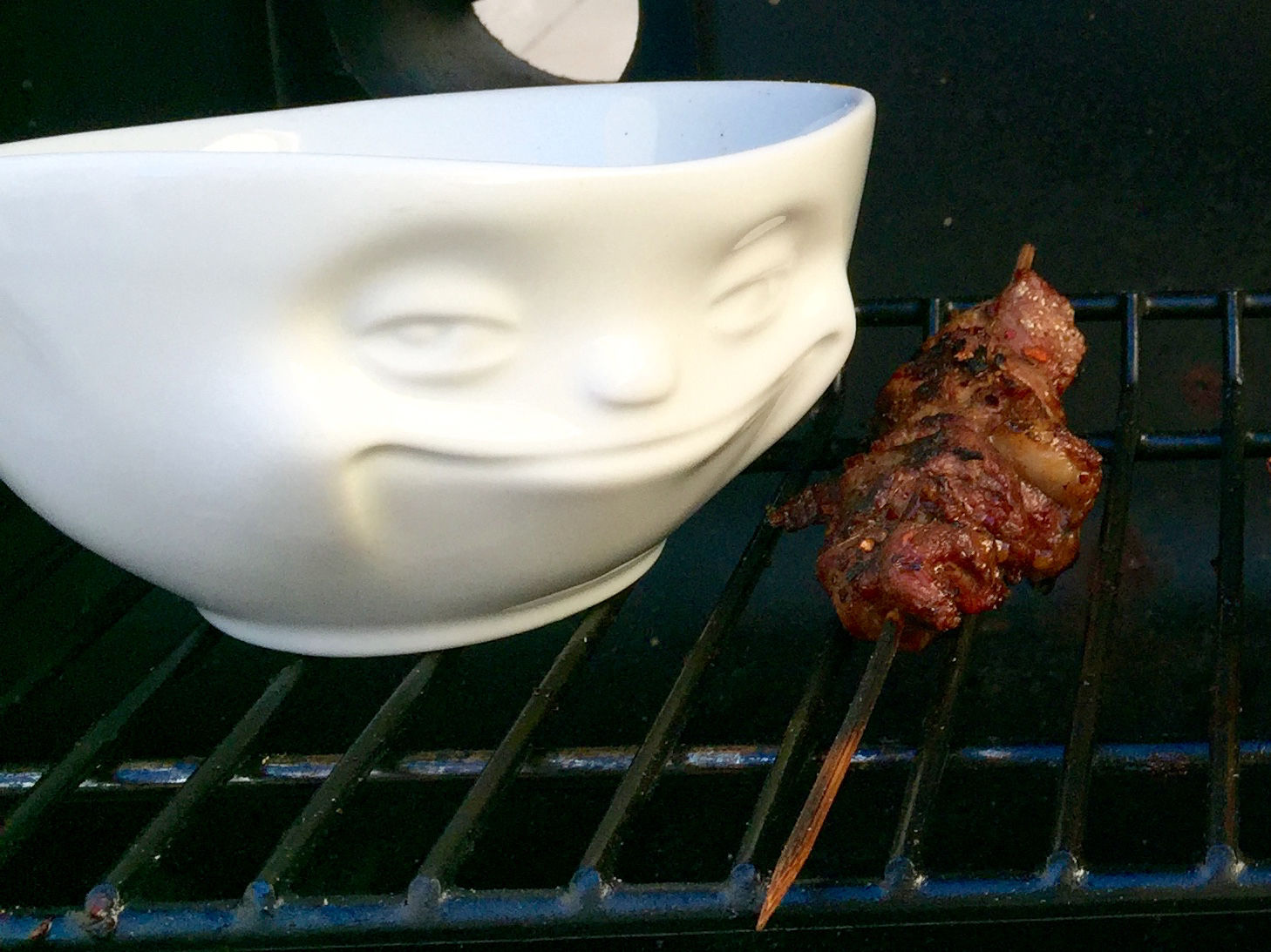  Sizzling Schezuan Skewers What’s the little treat that’s a huge hit at every BBQ? Answer: Sizzling skewers of meat! The bite-sized snacks are not only super easy to grill, but also offer tons of variety – especially combined with sauces and marinades. Our new favorite for the 2015 BBQ season: Sizzling lamb skewers with a fiery Schezuan-style spice blend. The Schezuan province in China is known for extra spicy treats – especially on the grill. Guests will be surprised when you throw these lamb skewers onto the flames, especially since lamb is usually served as cutlets or an entire leg. But grilling an entire leg to perfection is pretty advanced and requires real skills on the grill (“Are they done yet?! Really?!”). On the contrary, our little skewers are much more beginner-friendly… All spices and herbs are available at your local grocery store or Asian market. And we recommend organic cuts of lamb for extra flavor. Ready? Let’s get it sizzling! Ingredients 2 lb. lamb, either shoulder or leg (no need to trim any fat as it adds flavor) 1/2 lb. fresh cilantro as garnish About 30 wooden kabob skewers For the marinade 2 tbsp. cumin 2 tbsp. red pepper flakes 1 tbsp. black pepper 1 tbsp. powdered paprika 1/4 cup vegetable oil For the dry spice mixture 2 tbsp. cumin 2 tbsp. red pepper flakes 1 tbsp. black pepper 1 tbsp. brown sugar 